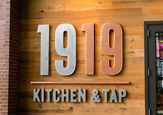 1919 Kitchen & Tap interior sign